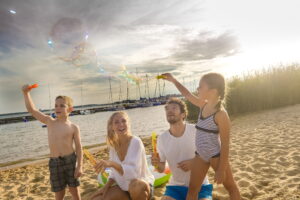 WelterbeRegion Anhalt-Dessau-Wittenberg e.V: Familie am Strand